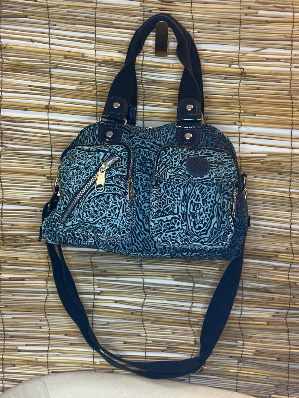 Teal and Black Patterned Shoulder Bag with Multiple Pockets